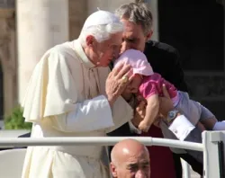 Pope Benedict kisses a baby girl during the Oct. 10, 2012 general audience in St. Peter's Square. ?w=200&h=150