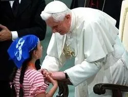Pope Benedict greets a child at the Vatican?w=200&h=150