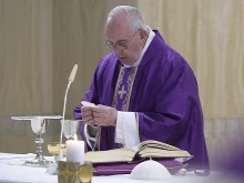 Pope Francis says Mass at the chapel of Santa Marta house in the Vatican, March 14, 2016. 
