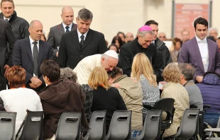 Pope Francis embraces the sick at a General Audience in St. Peter's Square, Nov. 18, 2015.   Daniel Ibanez/CNA.