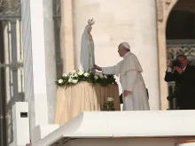 Pope Francis with a statue of Our Lady of Fatima at the General Audience in St. Peter's Square, May 13, 2015. 