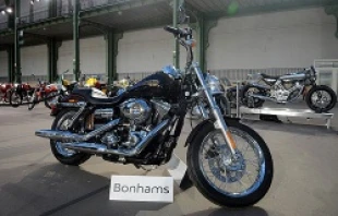 Pope Francis' 2013 Harley Davidson 1 585 cm3 Dyna Super Glide Custom on display at Le Grand Palais in Paris Feb. 5.   Antoine Antoniol/Getty Images News/Getty Images.