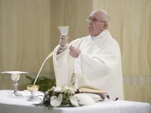 Pope Francis says Mass at the chapel of Santa Marta house in the Vatican, April 11, 2016. 