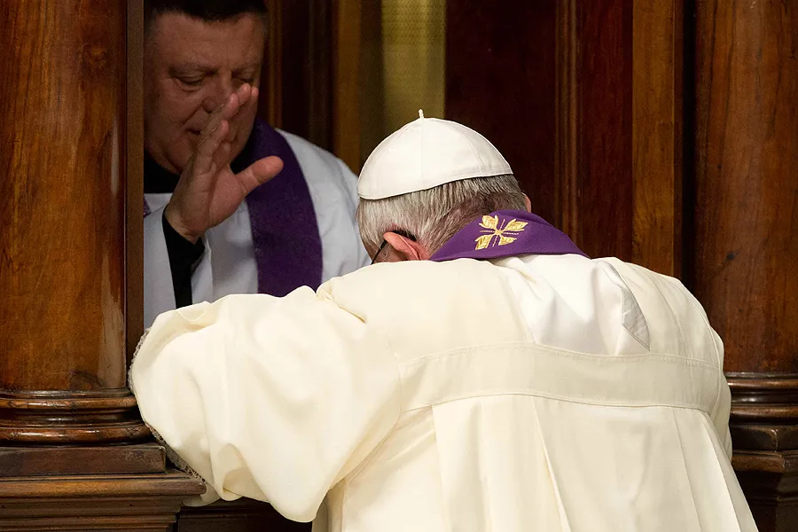 Pope Francis goes to Confession during a penitential celebration at St. Peter's Basilica, March 28, 2014. ?w=200&h=150