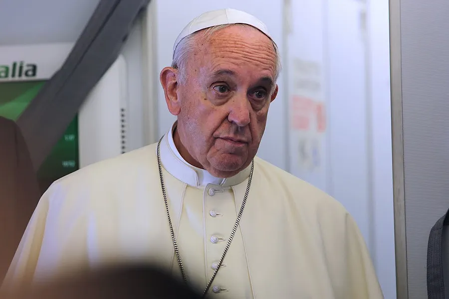 Pope Francis aboard the papal flight from Rome to Quito, July 5, 2015. ?w=200&h=150