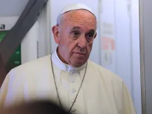 Pope Francis aboard the papal flight from Rome to Quito, July 5, 2015. 