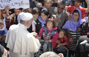 Pope Francis meets with refugees on the Greek island of Lesbos April 16, 2016.   LOR.