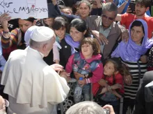 Pope Francis meets with refugees on the Greek island of Lesbos April 16, 2016. 