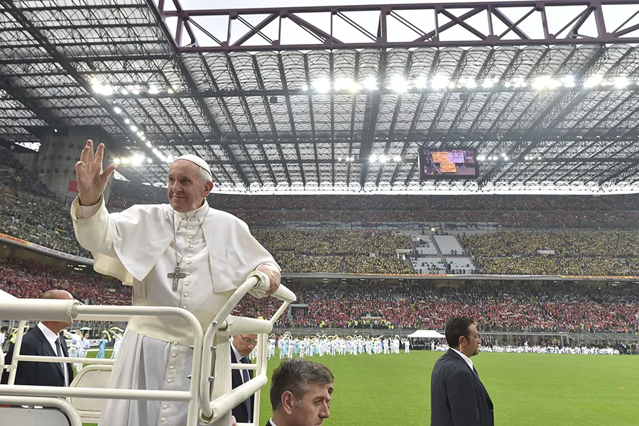 Pope Francis waves to the crowds of young people gathered in Meazza-San Siro Stadium during his day trip to Milan, Italy on March 25, 2017. ?w=200&h=150