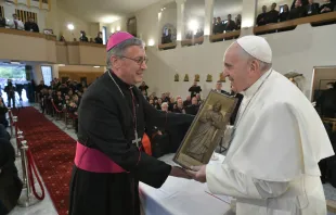 Pope Francis holds a small sculpture of Mother Teresa in Skopje's cathedral May 7, 2019.   Vatican Media.