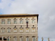 Pope Francis gives his Sunday Angelus address from the papal apartment window on Feb. 15, 2015. 