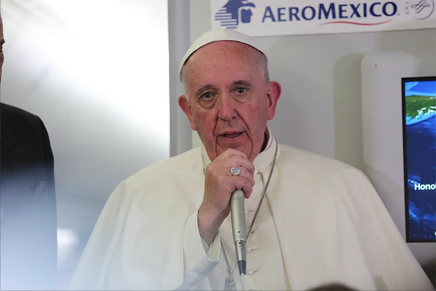 Pope Francis aboard the papal flight from Mexico to Rome on Feb. 17, 2016. ?w=200&h=150