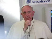 Pope Francis aboard the papal flight from Mexico to Rome on Feb. 17, 2016. 