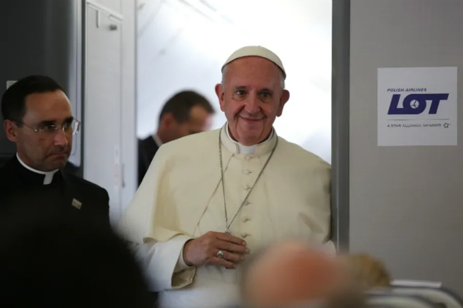 Pope Francis speaks to reporters aboard the papal flight from Krakow to Rome, July 31, 2016. ?w=200&h=150