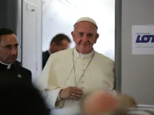 Pope Francis speaks to reporters aboard the papal flight from Krakow to Rome, July 31, 2016. 