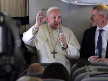 Pope Francis aboard the papal plane Sept. 10, 2019. 