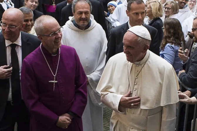 Pope Francis and Anglican Primate Archbishop Justin Welby walk into the church of San Gregorio al Cielo to pray Vepsers together Credit LOsservatore Romano CNA