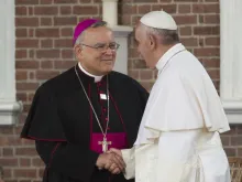 Archbishop Charles Chaput of Philadelphia greets Pope Francis at Independence Hall, Sept. 26, 2015. 
