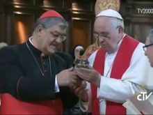 Pope Francis and Cardinal Sepe hold relic of St. Januarius' blood in Naples cathedral March 21, 2015.