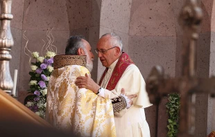 Pope Francis and Catholicos Karekin II pray together in Yeravan, Armenia, on June 26, 2016.   Edward Pentin/CNA