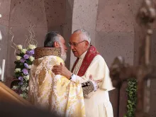 Pope Francis and Catholicos Karekin II pray together in Yeravan, Armenia, on June 26, 2016. 