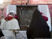 Pope Francis and Catholicos Karekin II pray at the Armenian apostolic cathedral in Gyumri, June 25, 2016. 