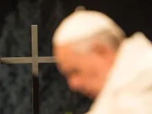 Pope Francis and a cross during the Stations of the Cross at the Coliseum in Rome, Italy on April 3, 2015. 