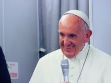 Pope Francis conducts a press conference aboard the papal plane, Dec. 2, 2017.  