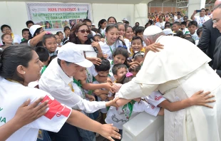 Pope Francis is greeted by a crowd at Padre Aldamiz International Airport in Puerto Maldonado, Peru, Jan. 19, 2018.   Vatican Media.