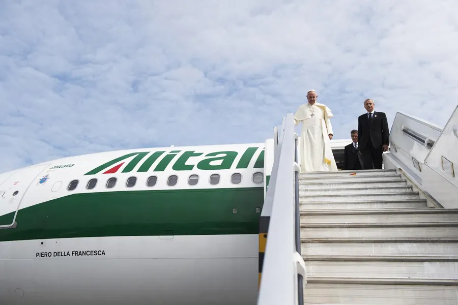 Pope Francis arrives at the Quito airport in Ecuador during his South America trip on July 5, 2015. ?w=200&h=150