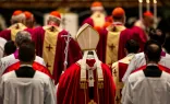 Pope Francis offers a Mass in St. Peter's Basilica for the repose of the souls of cardinals and bishops who died the previous year.