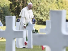 Pope Francis visits graves at the Sicily-Rome American Cemetery in Nettuno, Italy, Nov. 2, 2017. 