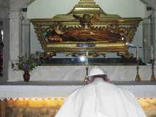 Pope Francis prays before the tomb of St. Filippa Mareri at a Franciscan convent in Borgo San Pietro, Italy, Aug. 9, 2016. 