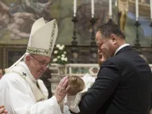 Pope Francis baptizes 26 infants in the Sistine Chapel Jan. 10, 2016. 