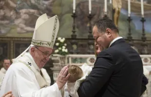 Pope Francis baptizes 26 infants in the Sistine Chapel Jan. 10, 2016.   Vatican Media.