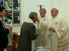  Pope Francis baptizes Hojin Lee on August 17, 2014. 