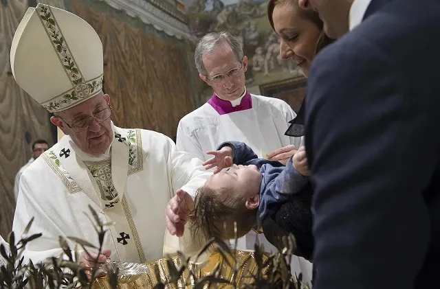 Pope Francis baptizes a baby in the Sistine Chapel Jan. 10, 2016. ?w=200&h=150