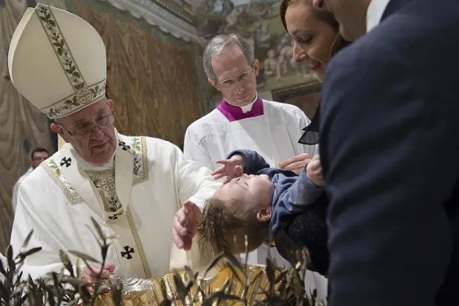 Pope Francis baptizes a baby in the Sistine Chapel Jan 10 2016 Credit LOsservatore Romano CNA