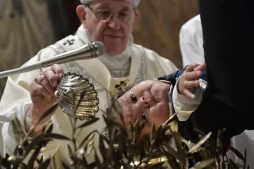 Pope Francis baptizes a baby in the Sistine Chapel Jan 13 2019 Credit Vatican Media CNA