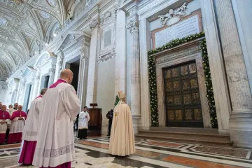 Pope Francis before the Holy Door of St Peters Basilica during the convocation of the Jubilee of Mercy April 11 2015 Credit LOsservatore Romano