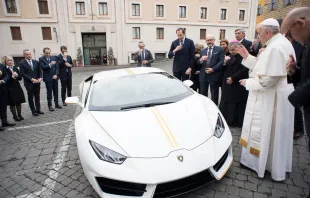 Pope Francis blesses a Lamborghini Huracán at the Vatican on Nov. 15, 2017.   L'Osservatore Romano.