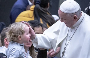 Pope Francis blesses a child on Jan. 12, 2020.   Daniel Ibanez/CNA.
