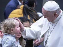 Pope Francis blesses a child on Jan. 12, 2020. 