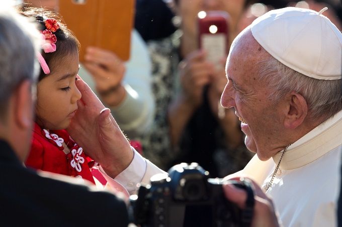 Pope Francis blesses a little girl in St. Peter's Square on Oct. 11, 2017. ?w=200&h=150