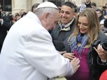 Pope Francis blesses a woman and her unborn child at a Jubilee Audience in St. Peter's Square, Jan. 30, 2016. 