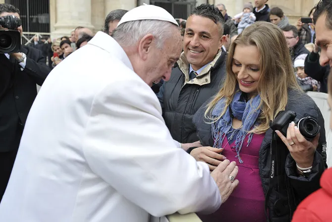 Pope Francis blesses a pregnant woman at the Jubilee Audience in St Peters Square Jan 30 2016 Credit LOsservatore Romano CNA 2 1 16