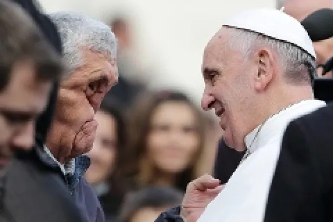 Pope Francis blesses a sick man after his general audience in St Peters Square Nov 20 2013 Credit Evandro Inetti ZUMAPRESScom CNA 11 20 13