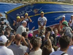 Pope Francis blesses the faithful during his July 8, 2013 visit to Lampedusa, Italy. ANSA/CIRO FUSCO.?w=200&h=150