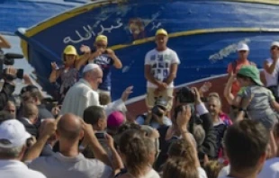 Pope Francis blesses the faithful during his July 8, 2013 visit to Lampedusa, Italy. ANSA/CIRO FUSCO.