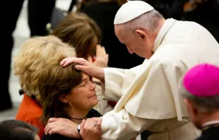 Pope Francis blesses a woman at a general audience in Paul VI Hall Dec. 5, 2018.   Daniel Ibanez/CNA.